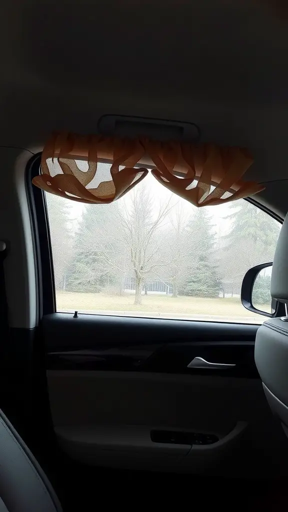 Cozy window treatment in a car, made of soft orange fabric for privacy.